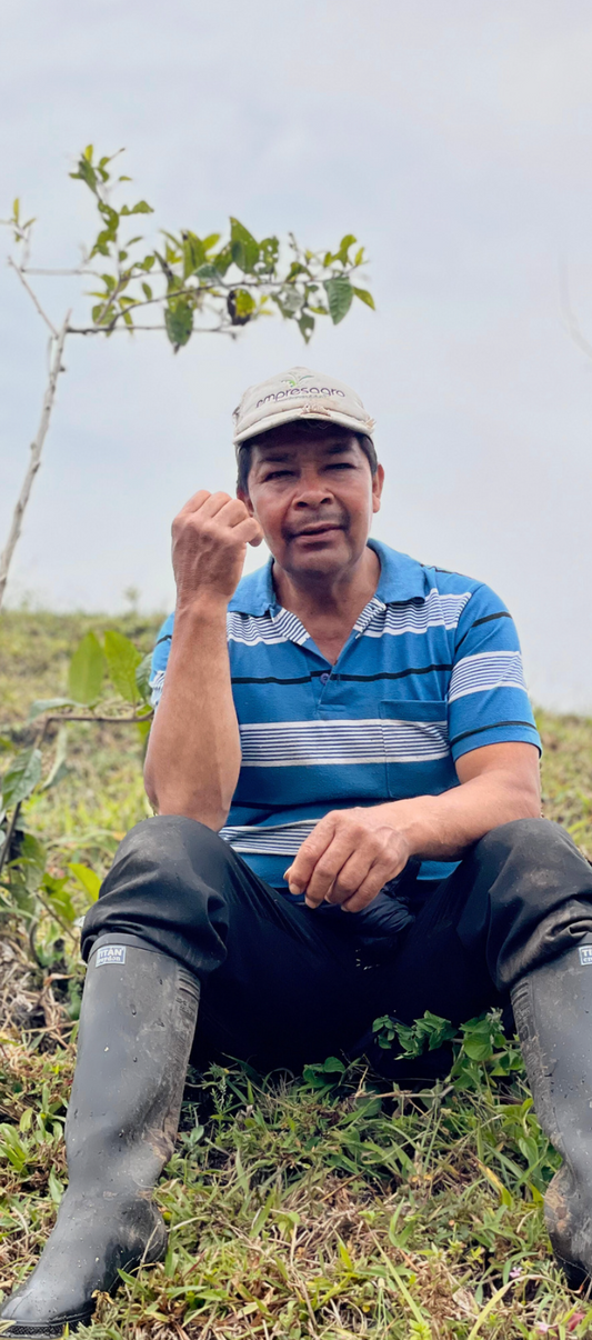 Reinaldo Chilito sitting on grass